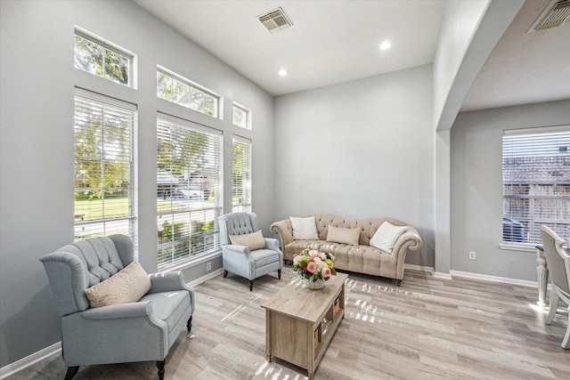 5206 Spring Oak Dr, Pasadena, TX 77505 - living room featuring light wood finished floors, baseboards, and recessed lighting