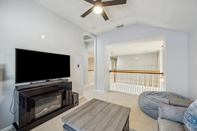 5206 Spring Oak Dr, Pasadena, TX 77505 - carpeted living area with ceiling fan and lofted ceiling