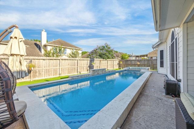 5206 Spring Oak Dr, Pasadena, TX 77505 - view of swimming pool featuring a fenced backyard, central AC, and a patio