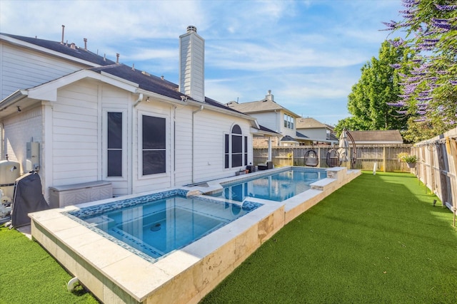 5206 Spring Oak Dr, Pasadena, TX 77505 - view of swimming pool with a pool with connected hot tub
