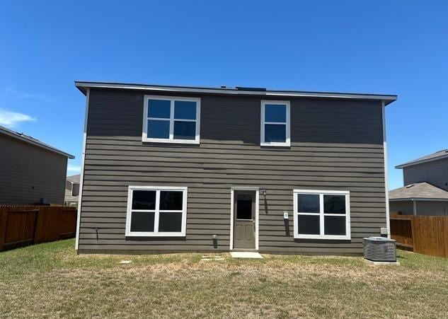 11822 Claudette St, San Antonio, TX 78252 - rear view of property featuring central AC unit