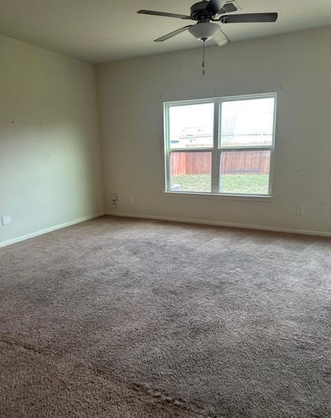 11822 Claudette St, San Antonio, TX 78252 - carpeted empty room featuring baseboards and ceiling fan