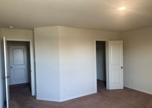 11822 Claudette St, San Antonio, TX 78252 - empty room featuring carpet floors and baseboards