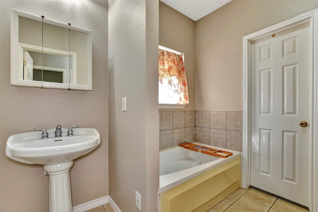 34606 Lake Side Dr, Brookshire, TX 77423 - full bathroom featuring tile patterned flooring, a tub with jets, and a sink
