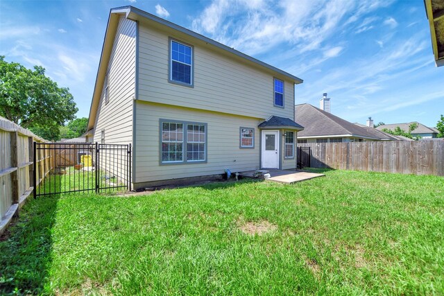 34606 Lake Side Dr, Brookshire, TX 77423 - back of property with a gate