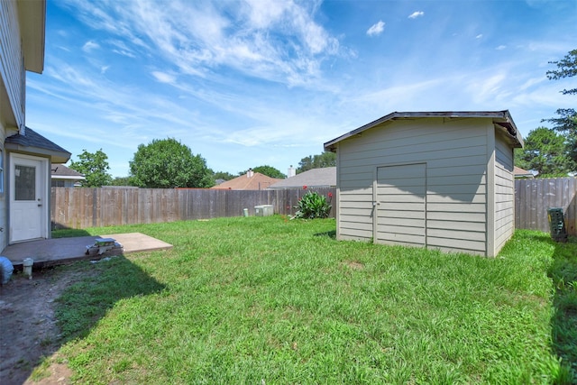 34606 Lake Side Dr, Brookshire, TX 77423 - view of yard featuring a storage shed and an outdoor structure