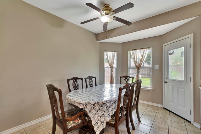 34606 Lake Side Dr, Brookshire, TX 77423 - dining space with baseboards, light tile patterned floors, and ceiling fan