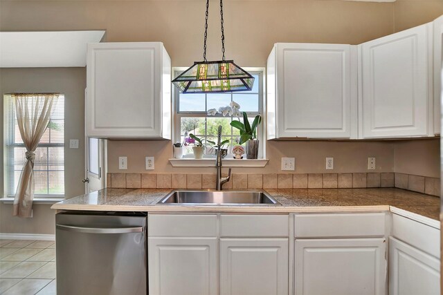 34606 Lake Side Dr, Brookshire, TX 77423 - kitchen featuring dishwasher, a sink, tile counters, and white cabinetry