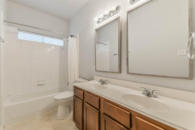 2212 Highland Crossing Dr, Conroe, TX 77304 - full bathroom with shower / bath combo with shower curtain, toilet, double vanity, and tile patterned floors