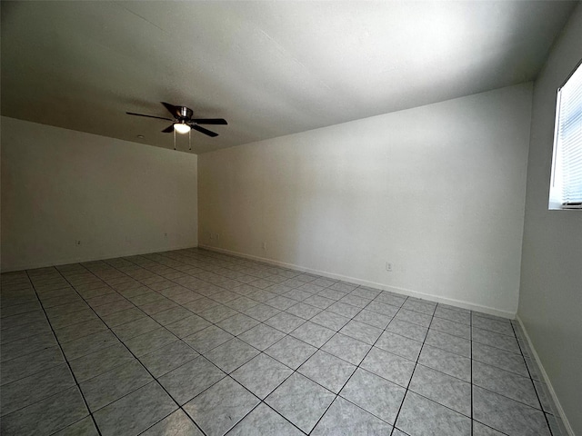 1023 W Snyder St, Alvin, TX 77511 - unfurnished room featuring a ceiling fan and light tile patterned floors