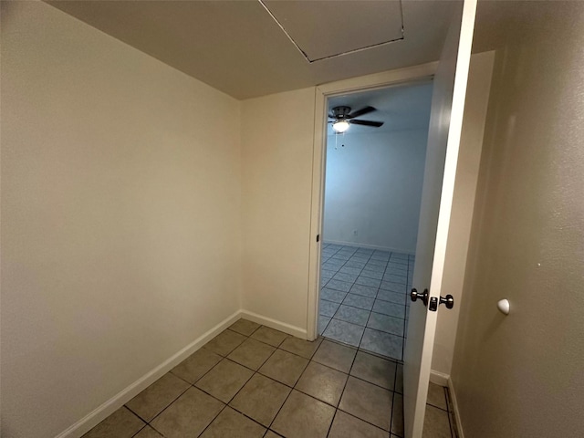 1023 W Snyder St, Alvin, TX 77511 - spare room with light tile patterned floors and baseboards