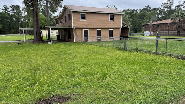 530 N Cattle Dr, Onalaska, TX 77360 - back of property featuring a carport