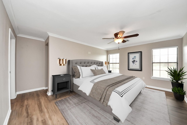 9731 Hadden Rd, Baytown, TX 77521 - bedroom featuring wood finished floors, baseboards, crown molding, and ceiling fan