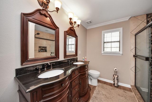 9731 Hadden Rd, Baytown, TX 77521 - bathroom with wood finished floors, a stall shower, toilet, double vanity, and baseboards