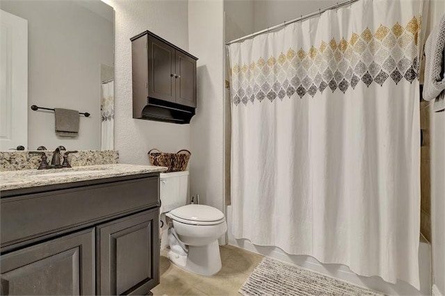 10210 Grape Creek Grove Ln, Cypress, TX 77433 - bathroom featuring vanity, toilet, tile patterned floors, and shower / bathtub combination with curtain