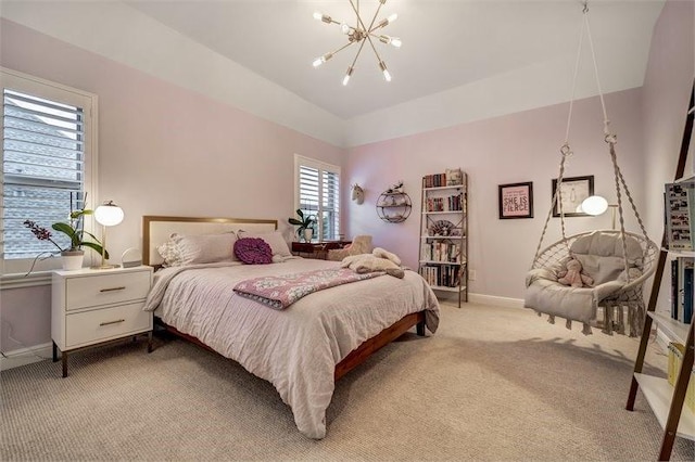 10210 Grape Creek Grove Ln, Cypress, TX 77433 - bedroom featuring a chandelier, light colored carpet, and baseboards
