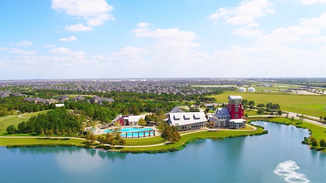 5714 Spring River Ln, Fulshear, TX 77441 - aerial view of a large body of water, a pool area, and a tree filled landscape