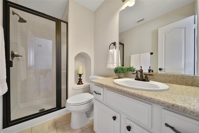 5714 Spring River Ln, Fulshear, TX 77441 - bathroom featuring vanity, a stall shower, toilet, and tile patterned floors