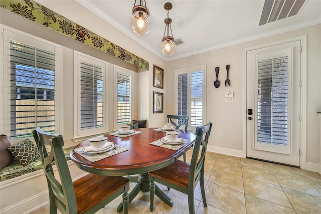 5714 Spring River Ln, Fulshear, TX 77441 - dining room with baseboards, ornamental molding, and light tile patterned flooring