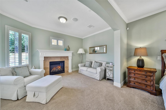 5714 Spring River Ln, Fulshear, TX 77441 - living room featuring crown molding, carpet floors, a tiled fireplace, and baseboards