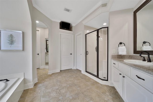 5714 Spring River Ln, Fulshear, TX 77441 - bathroom featuring a shower stall, vanity, a bath, crown molding, and baseboards