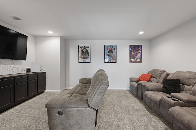 living room with light carpet, recessed lighting, and baseboards