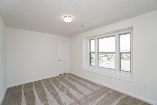 4822 Westfield Ranch Ct, Katy, TX 77449 - empty room featuring baseboards and light carpet