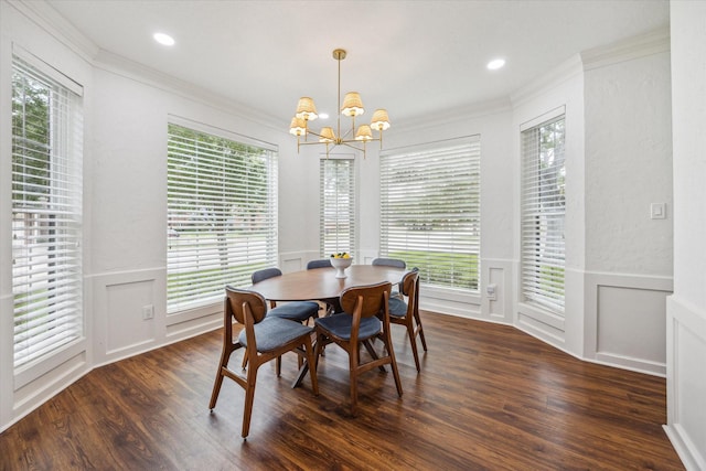 1602 Kelliwood Oaks Dr, Katy, TX 77450 - dining space featuring a decorative wall, ornamental molding, dark wood finished floors, a chandelier, and wainscoting