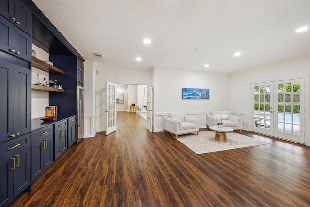 1602 Kelliwood Oaks Dr, Katy, TX 77450 - living room with french doors, crown molding, dark wood finished floors, and recessed lighting