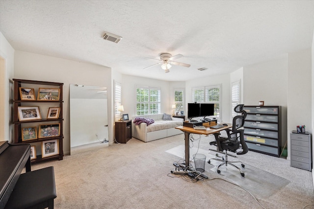 1602 Kelliwood Oaks Dr, Katy, TX 77450 - office area featuring a ceiling fan, light colored carpet, and a textured ceiling