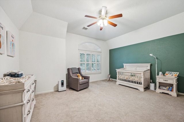 1602 Kelliwood Oaks Dr, Katy, TX 77450 - bedroom with a crib, light carpet, vaulted ceiling, and ceiling fan