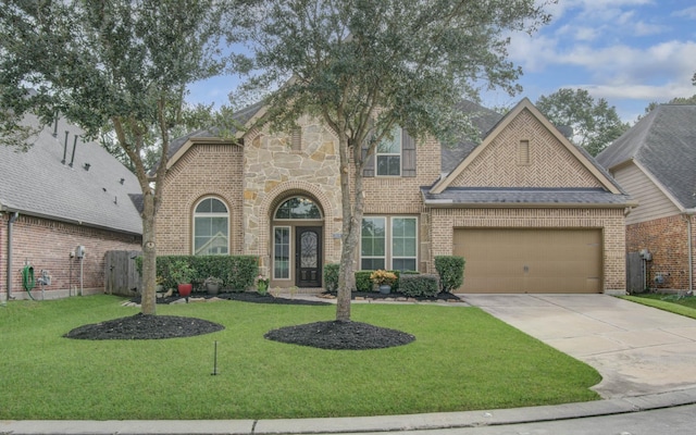 3539 Vasser Ridge Dr, Spring, TX 77388 - view of front of house with brick siding, an attached garage, concrete driveway, and a front yard