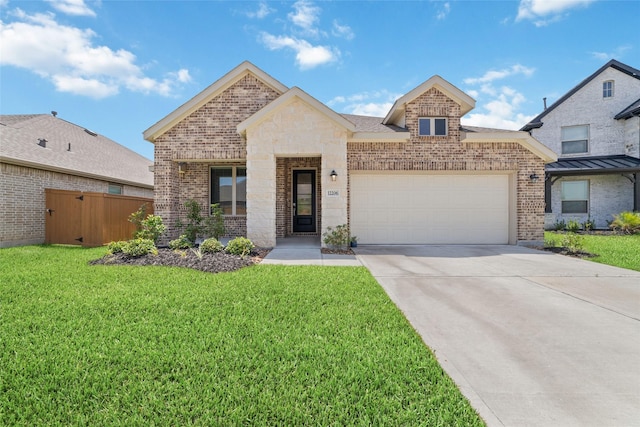 12206 English Mist Dr, Houston, TX 77044 - view of front of home with brick siding, an attached garage, and driveway