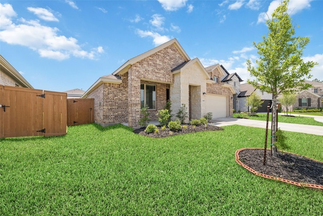 12206 English Mist Dr, Houston, TX 77044 - view of front of property featuring brick siding, concrete driveway, and a garage