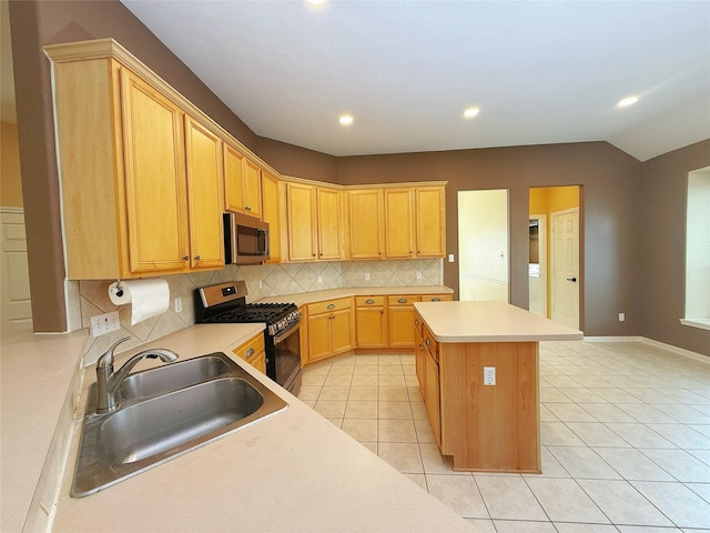 16322 E Amber Willow Trl, Cypress, TX 77433 - kitchen featuring appliances with stainless steel finishes, a sink, a center island, light tile patterned floors, and recessed lighting