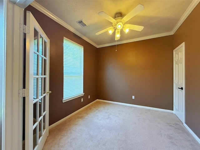 16322 E Amber Willow Trl, Cypress, TX 77433 - empty room with carpet, a ceiling fan, baseboards, ornamental molding, and a textured ceiling