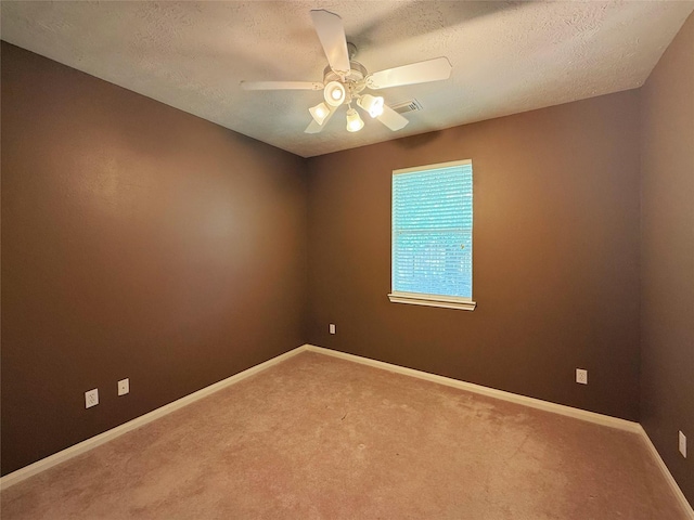 16322 E Amber Willow Trl, Cypress, TX 77433 - empty room with ceiling fan, a textured ceiling, carpet floors, and baseboards