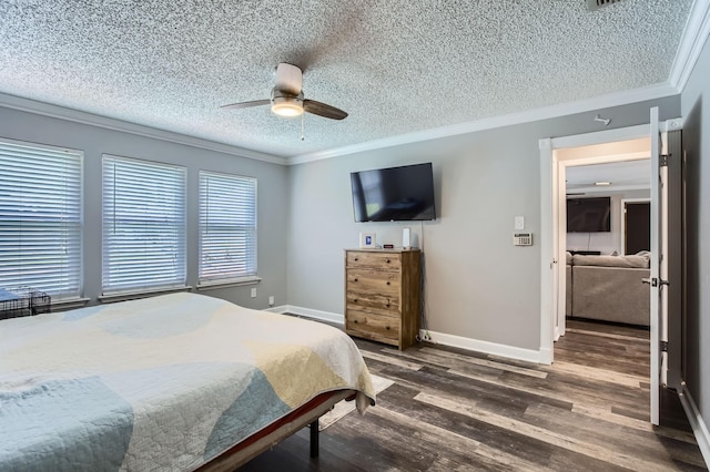 15335 Poplar Grove Dr, Houston, TX 77068 - bedroom featuring ornamental molding, dark wood-style flooring, a textured ceiling, baseboards, and a ceiling fan