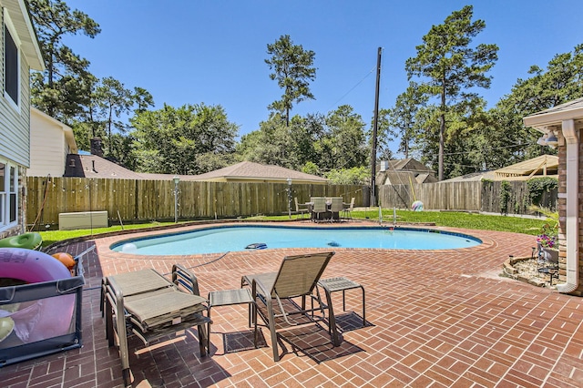 15335 Poplar Grove Dr, Houston, TX 77068 - view of pool with a fenced backyard and a patio area