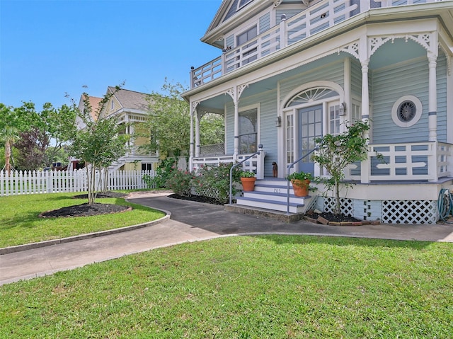 1515 24th St, Galveston, TX 77550 - view of front facade featuring covered porch