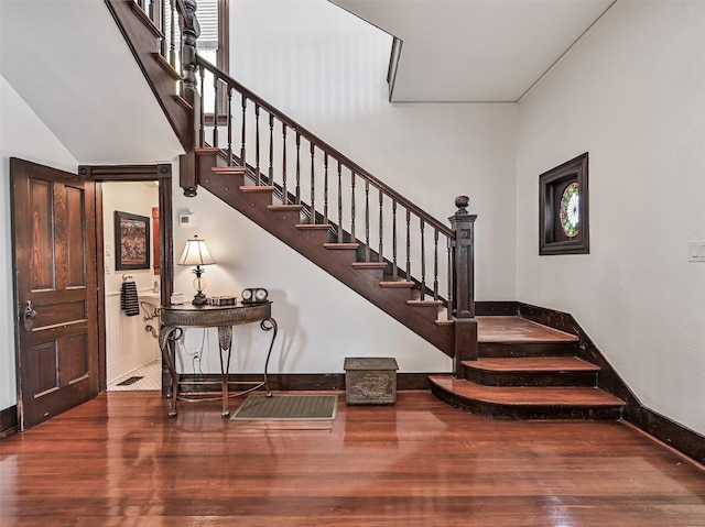 1515 24th St, Galveston, TX 77550 - stairway with wood finished floors and baseboards