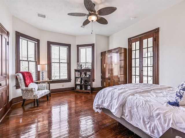 1515 24th St, Galveston, TX 77550 - bedroom featuring hardwood / wood-style flooring, baseboards, and ceiling fan