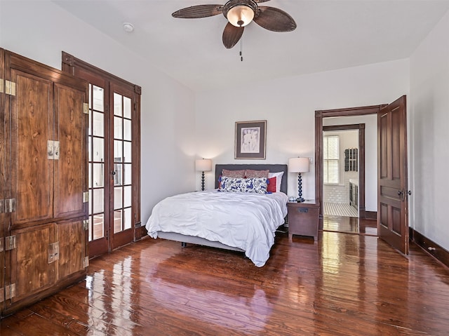 1515 24th St, Galveston, TX 77550 - bedroom with wood finished floors, multiple windows, baseboards, and french doors