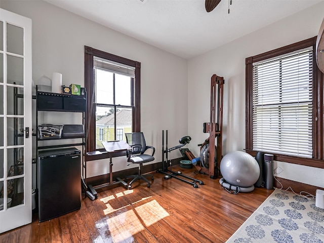 1515 24th St, Galveston, TX 77550 - workout area featuring wood finished floors and ceiling fan