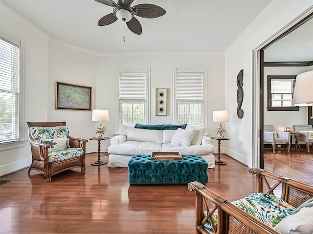 1515 24th St, Galveston, TX 77550 - living area featuring ornamental molding, a ceiling fan, wood finished floors, and baseboards