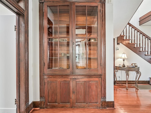 1515 24th St, Galveston, TX 77550 - detailed view of wood finished floors and baseboards