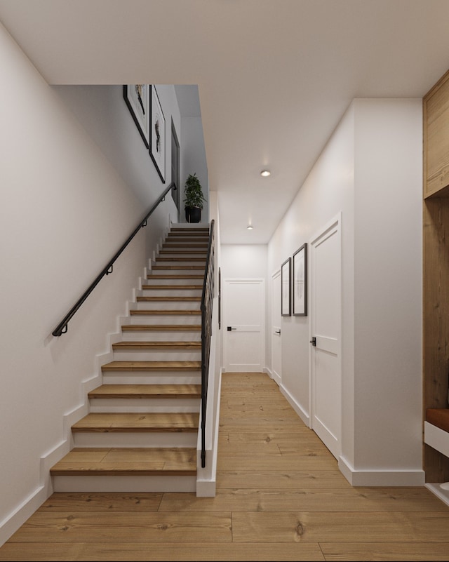 5507 Hershe St, Houston, TX 77020 - stairs featuring hardwood / wood-style flooring and recessed lighting