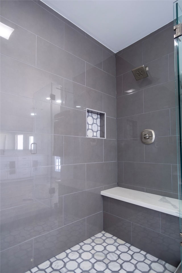 301 Commander Dr, Tiki Island, TX 77554 - full bath featuring tiled shower and tile patterned flooring