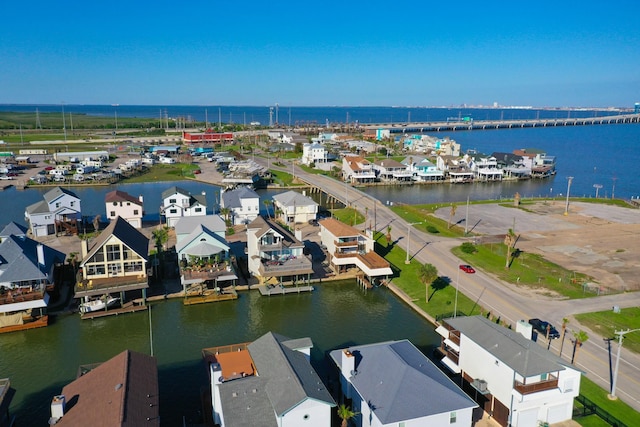 301 Commander Dr, Tiki Island, TX 77554 - aerial perspective of suburban area featuring a nearby body of water
