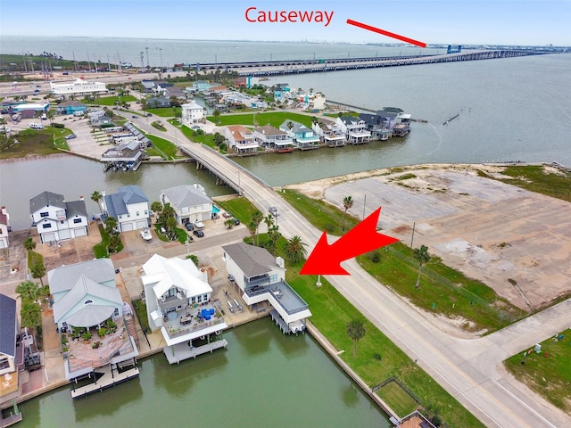 301 Commander Dr, Tiki Island, TX 77554 - bird's eye view of a notable bridge and a nearby body of water